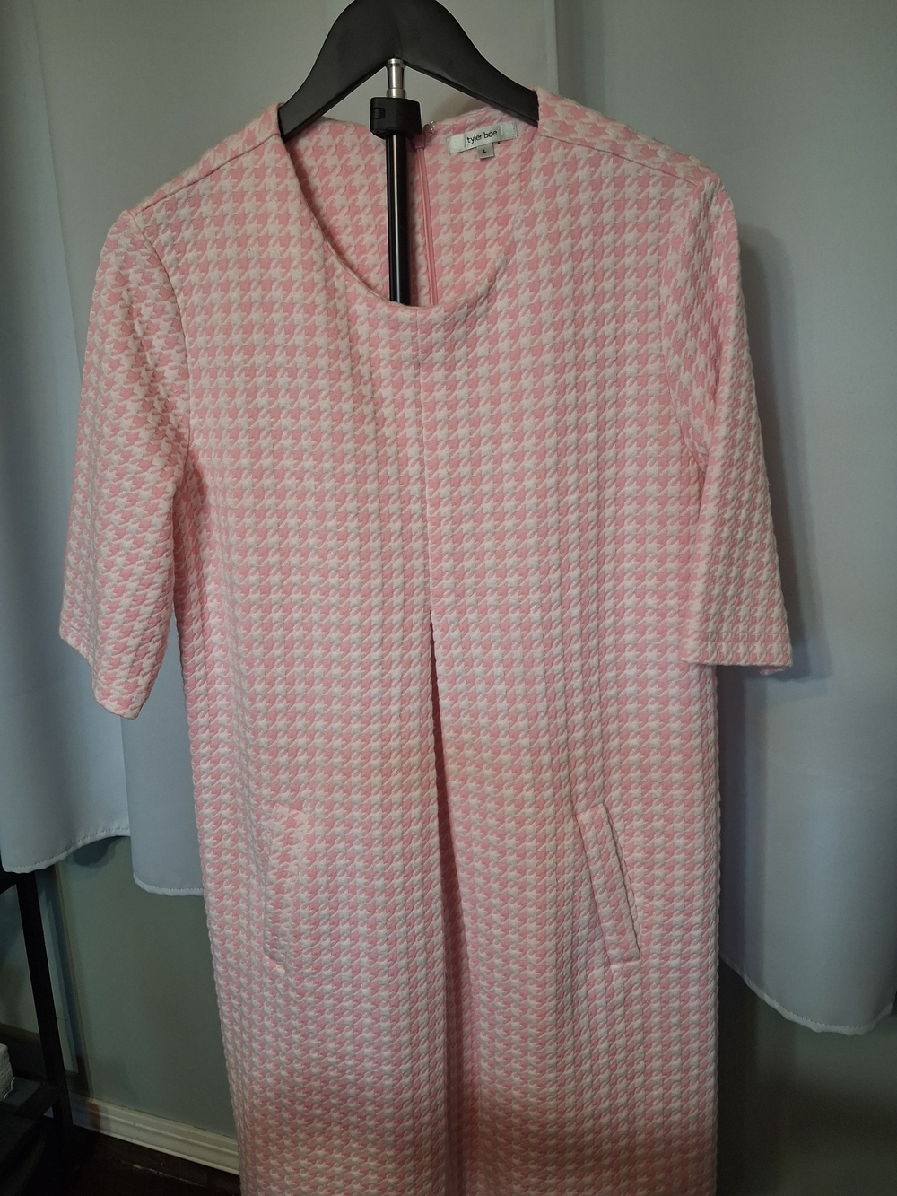 Vintage-Inspired Pink Houndstooth Dress With Front Pockets.